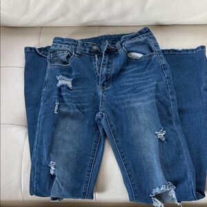 Distressed Blue Jeans